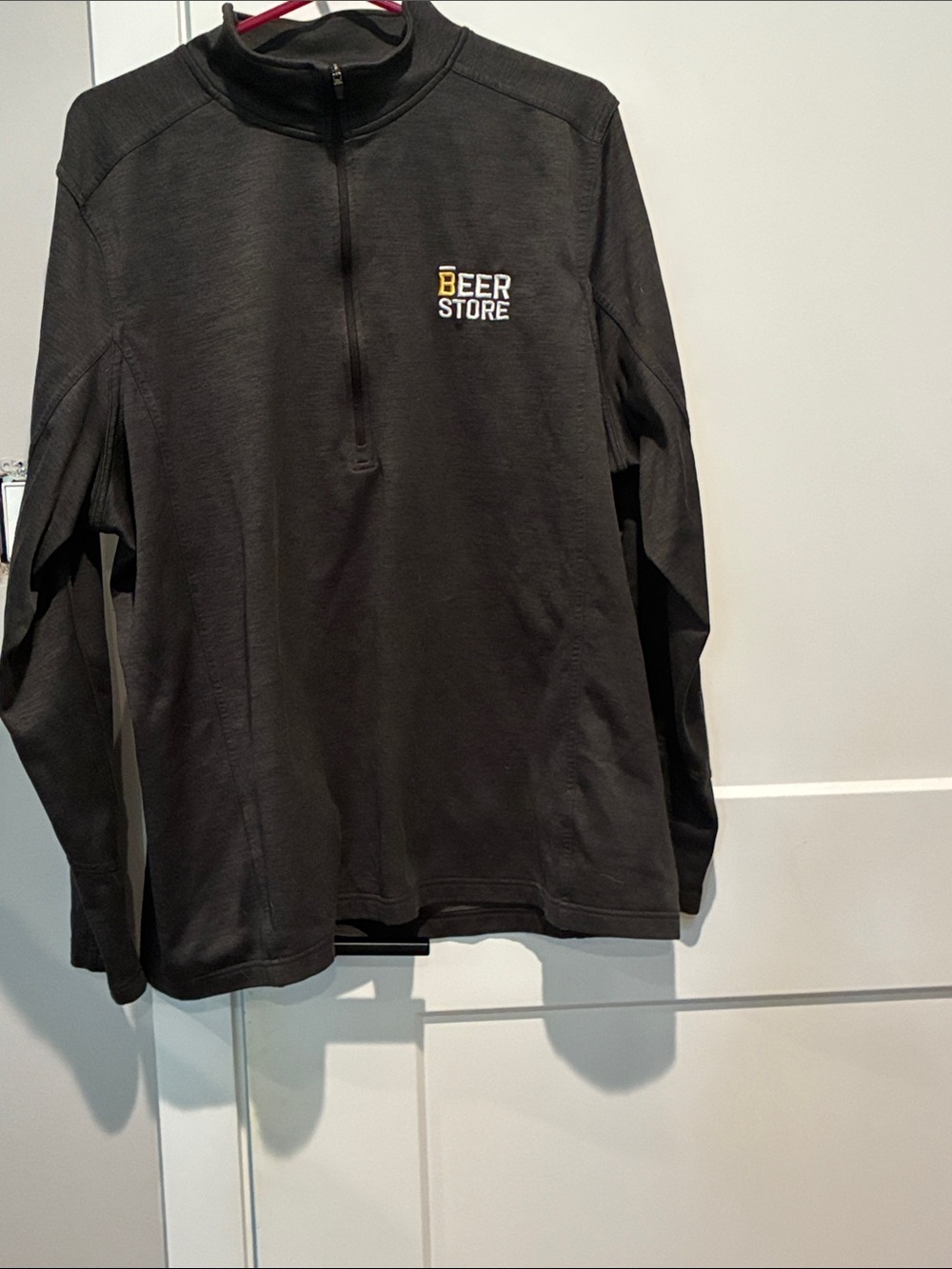 Women’s 1/4 zip Beer Store top. B30